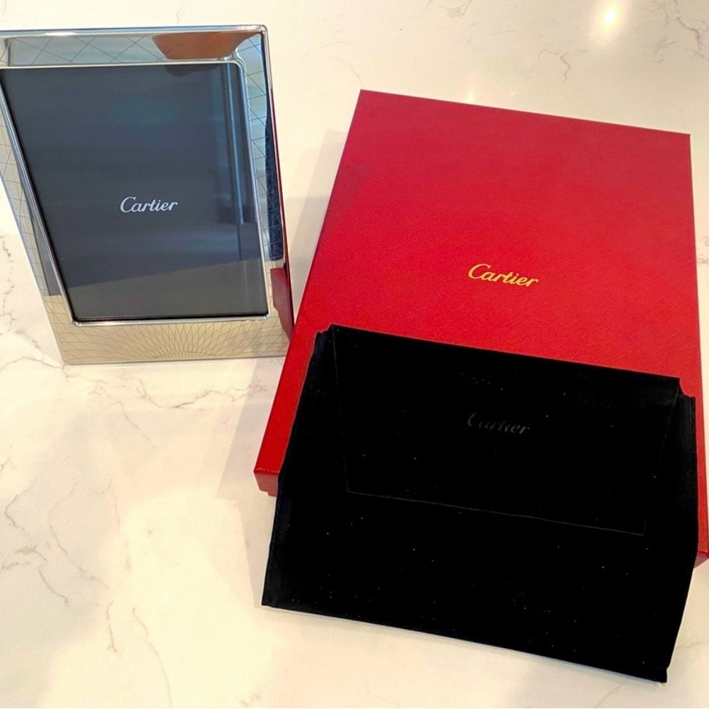Cartier Brand New frame.  7 1/2 x 5 1/2.  Fits pictures 5 1/2 x 4 1/2.